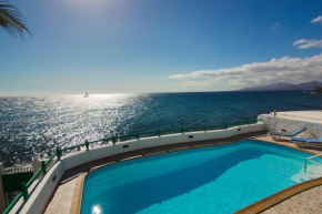 Отель Villa Caleton  Пуерто Кармен